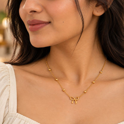 Elegant Bow Pendant Necklace – 18K Gold-Plated