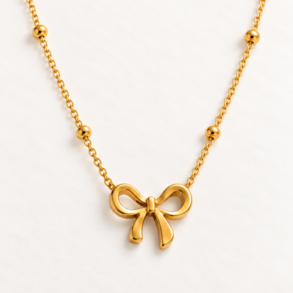 Elegant Bow Pendant Necklace – 18K Gold-Plated